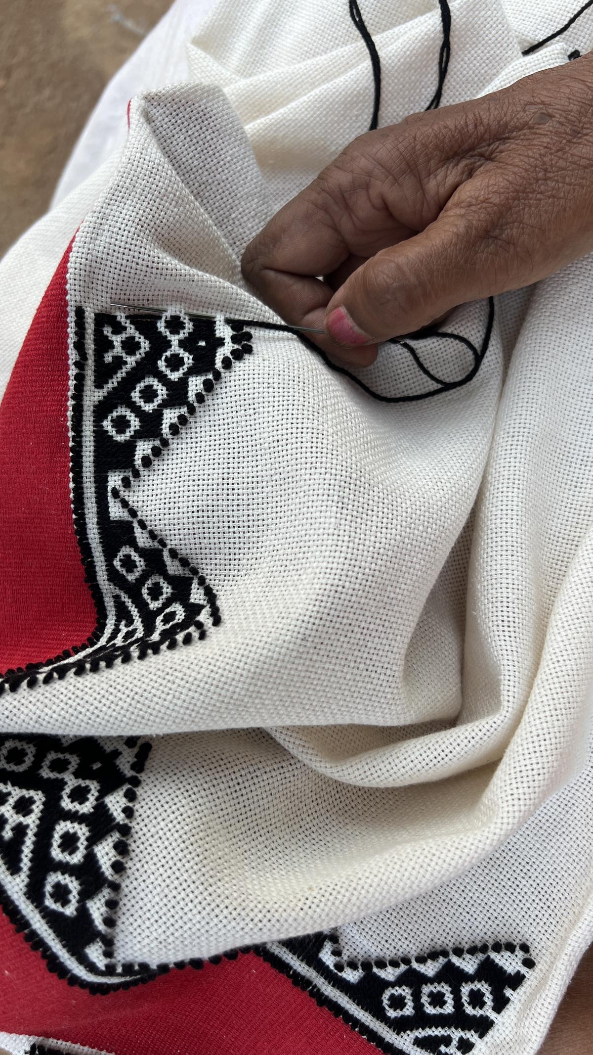 Geometric shapes, including diamonds, triangles and hearts are vastly seen in Toda shawls