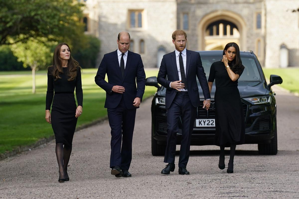 From left, Kate, the Princess of Wales, Prince William, Prince of Wales, Prince Harry and Meghan, Duchess of Sussex walk to meet members of the public at Windsor Castle, following the death of Queen Elizabeth II on Thursday., in Windsor, England, Saturday, Sept. 10, 2022