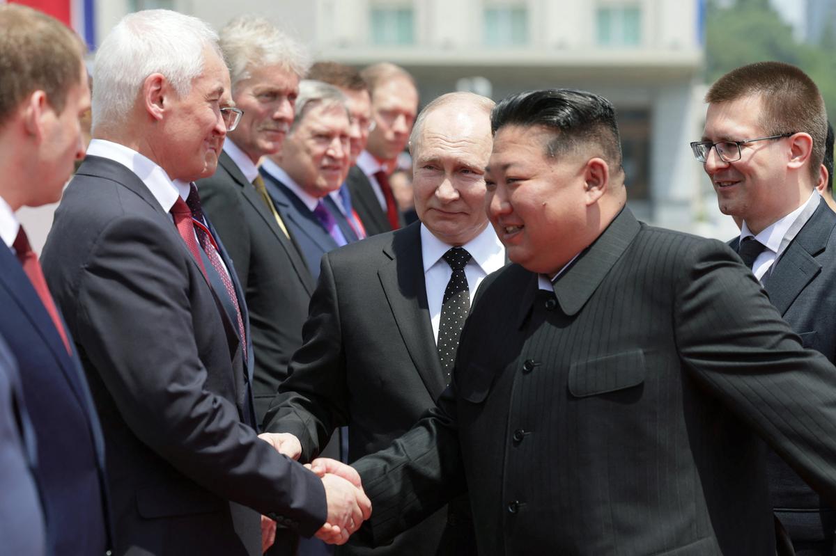 Russia’s President Vladimir Putin watches as North Korea’s leader Kim Jong-un shakes hands with Russia’s Defence Minister Andrei Belousov during an official welcoming ceremony at Kim Il Sung Square in Pyongyang, North Korea on June 19, 2024. Photo: Via Reuters