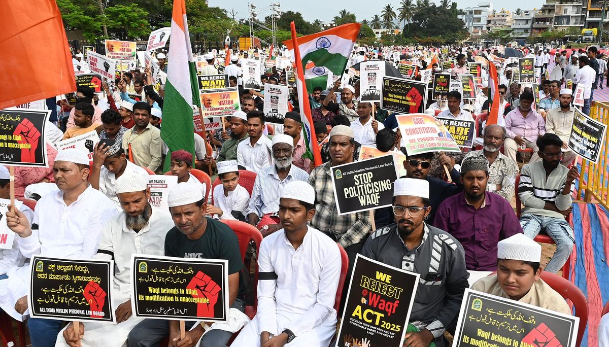 Protesters held placards during the protests on the WAQF (Amendment) Act held on Saturday in Idgah Maidan in Mysoru.