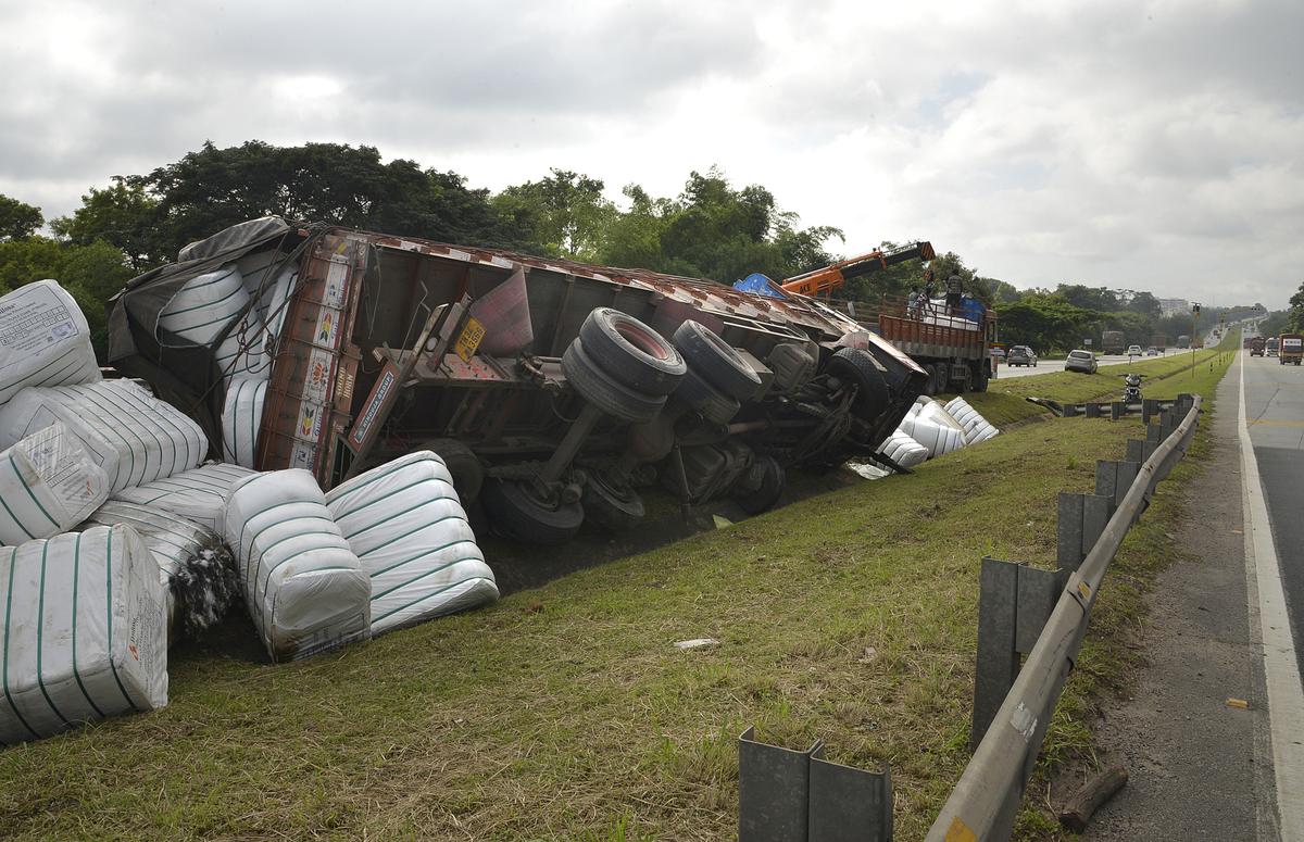 A truck lost control and fell on a slope in the middle of NICE road in Bengaluru. 