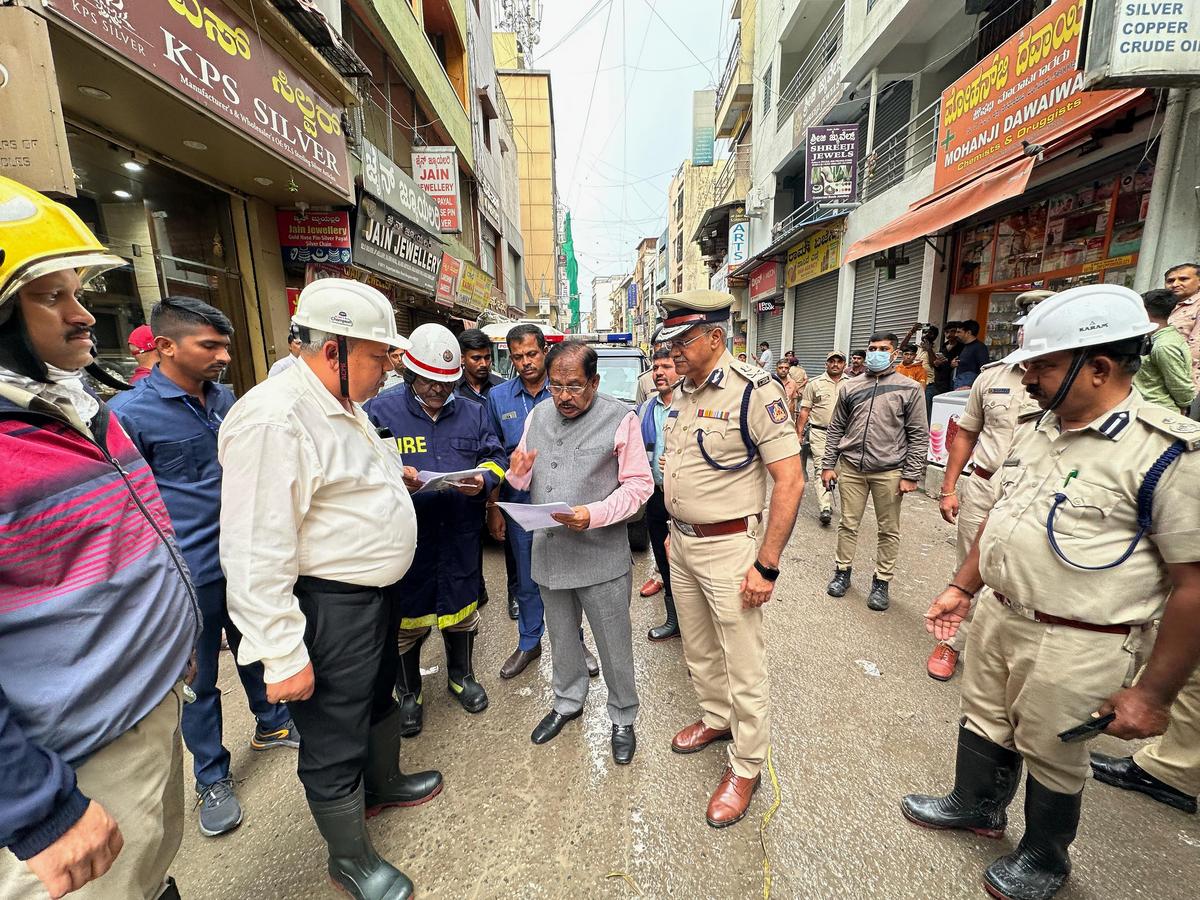 Home minister G. Parameshwara, visiting the site at Nagarathpete, Bengaluru on Saturday.