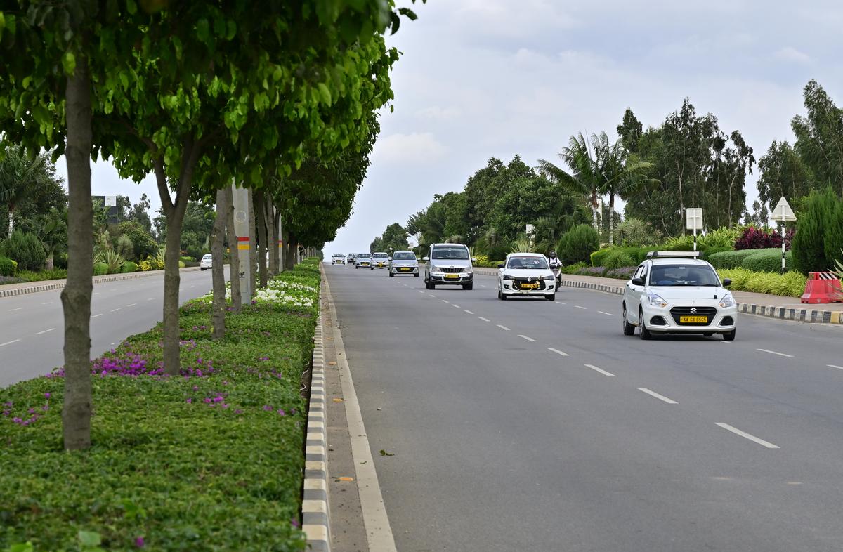 The six-lane tree-lined road at the airport city in Bengaluru.