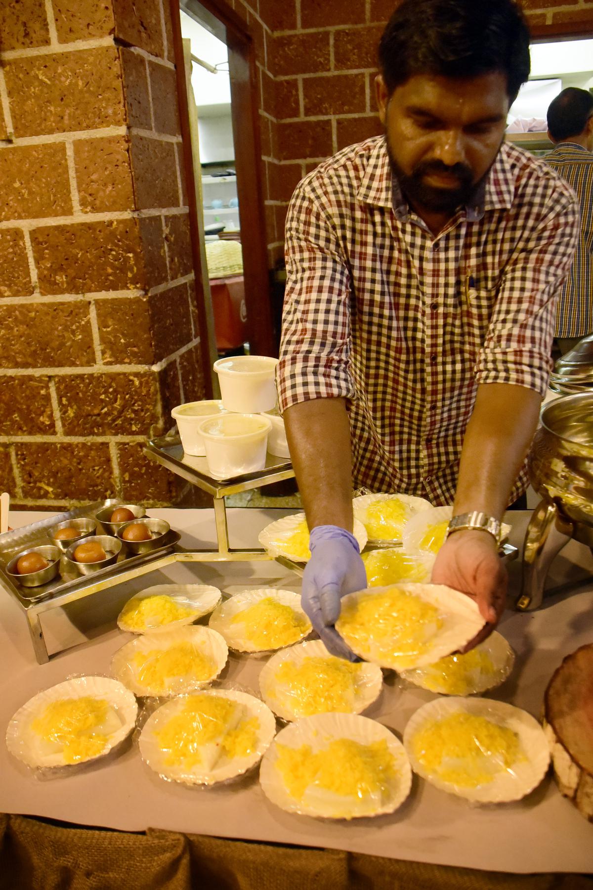 Muttamaala being packed at Adaminte Chayakkada restaurant in Kozhikode