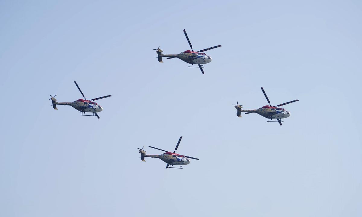 Air show by Sarang, a helicopter display team of the Indian Air Force, during the Beypore International Water Fest in Kozhikode on Saturday.