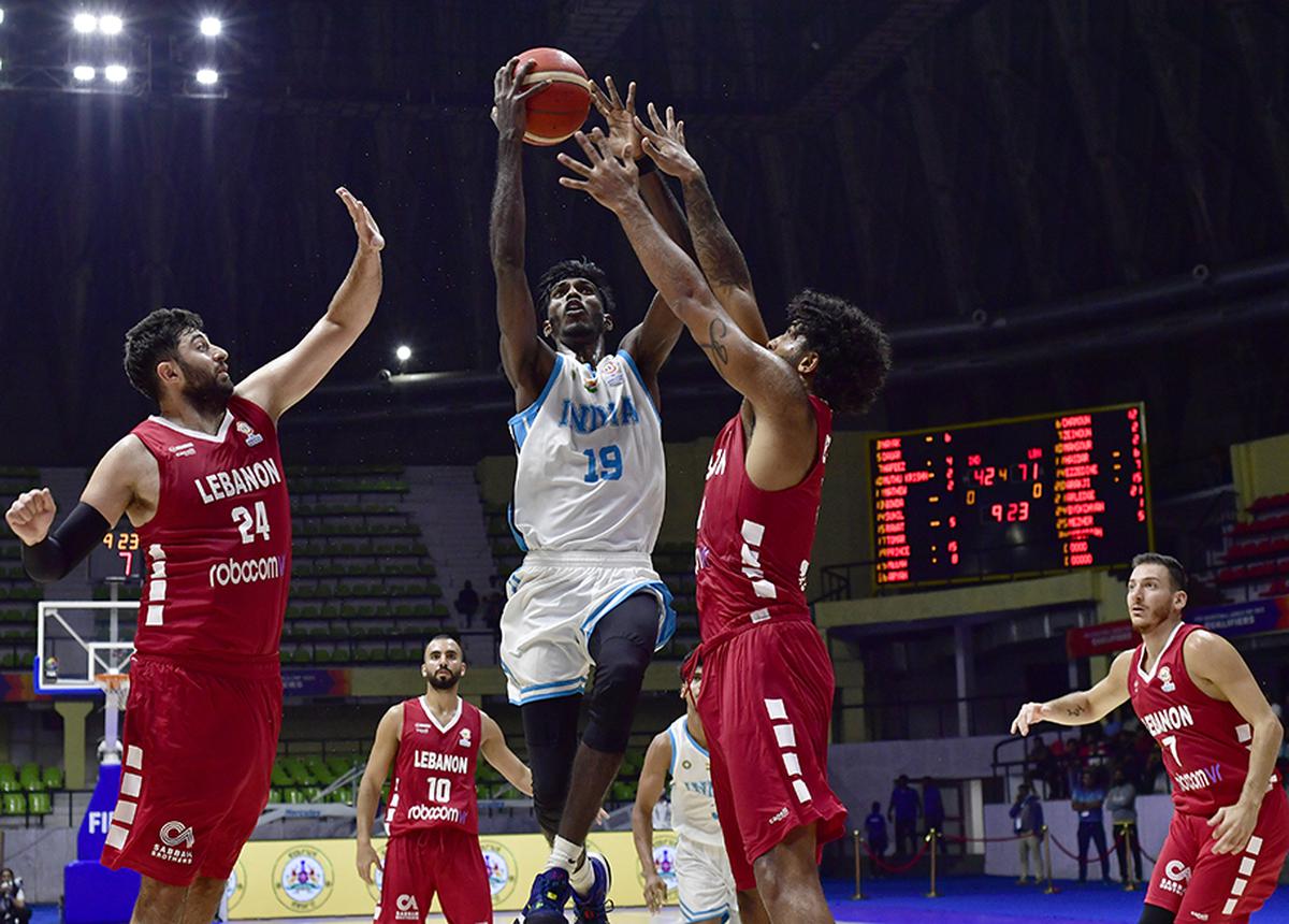India’s Pranav Prince (19), scores during the FIBA Basketball World Cup 2023 qualifiers match between India and Lebanon, at the Sri Kanteerava Indoor Stadium, in Bengaluru on August 29, 2022.  