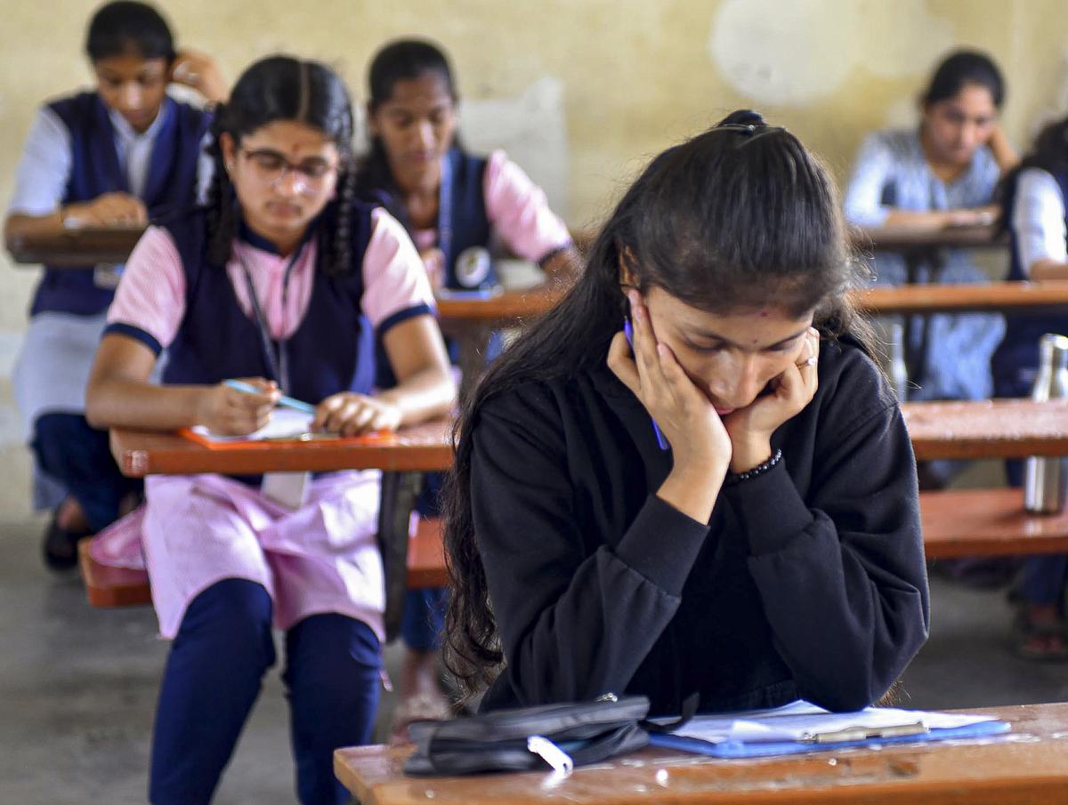 Students appearing for the annual SSLC exam Hubballion Friday.