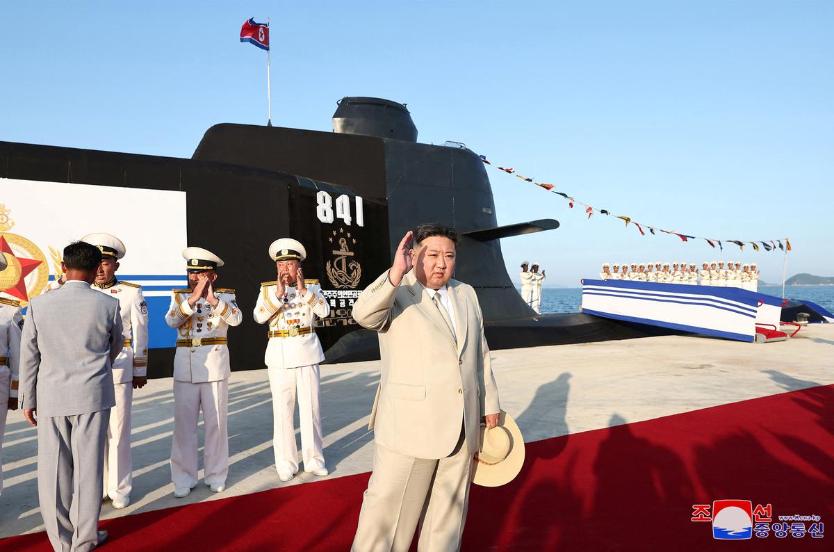North Korean leader Kim Jong Un attends what state media report was a launching ceremony for a new tactical nuclear attack submarine in North Korea, in this handout image released September 8, 2023. Photo: KCNA via Reuters