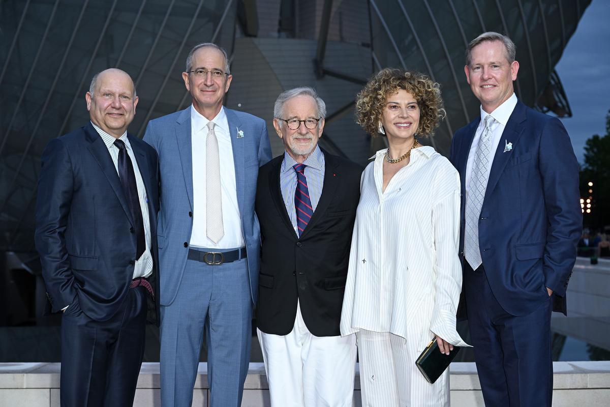 PARIS, FRANCE - JULY 25: Chris Meledandri, Brian L. Roberts, Steven Spielberg, Donna Langley and Mike Cavanagh attend ‘Prelude to the Olympics’ at Fondation Louis Vuitton on July 25, 2024 in Paris, France