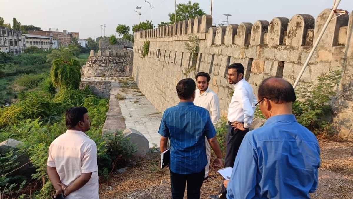 Deputy Commissioner Nitish K. takes a look at the moat outside Raichur fort on April 22, 2025.