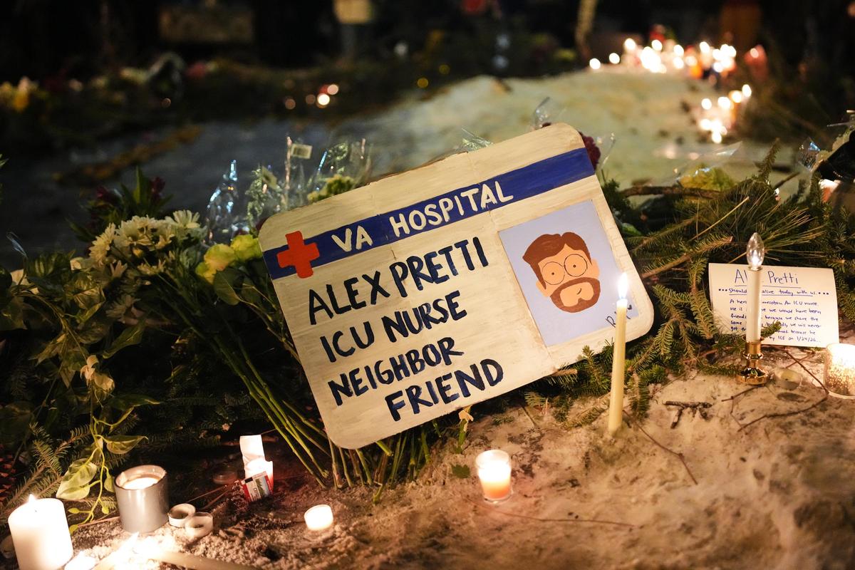 A sign for 37-year-old Alex Pretti, who was fatally shot by a U.S. Border Patrol officer earlier in the day, is displayed during a vigil on Janury 24, 2026, in Minneapolis. A sign for 37-year-old Alex Pretti, who was fatally shot by a U.S. Border Patrol officer earlier in the day, is displayed during a vigil on Janury 24, 2026, in Minneapolis.