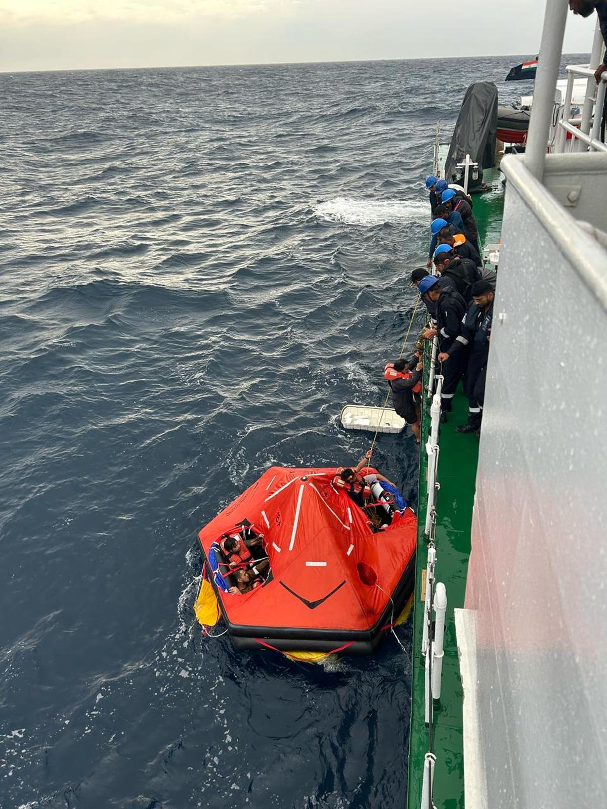 The stranded crew being rescued by Indian Coast Guard personnel. The stranded crew being rescued by Indian Coast Guard personnel.