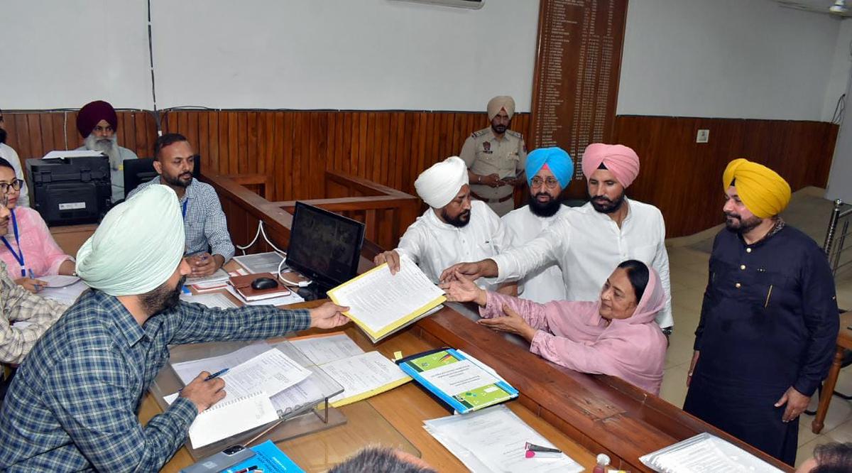 Congress candidate Karamjit Kaur files her nomination papers for the Jalandhar Lok Sabha byelection in presence of party leaders Charanjit Singh Channi, Amarinder Singh Raja Warring and Navjot Singh Sidhu, on April 13, 2023. Congress candidate Karamjit Kaur files her nomination papers for the Jalandhar Lok Sabha byelection in presence of party leaders Charanjit Singh Channi, Amarinder Singh Raja Warring and Navjot Singh Sidhu, on April 13, 2023.