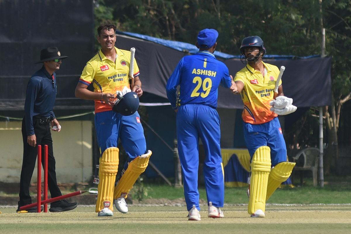 Maharashtra’s Arshin and Tripathi after winning against Hyderabad. 