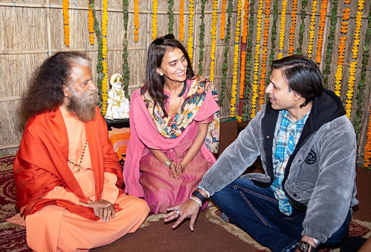 Bollywood actor Vivek Oberoi with his wife Priyanka Alva Oberoi meets Parmarth Niketan Ashram president Swami Chidanand Saraswati during the ongoing ‘Maha Kumbh 2025’, in Prayagraj