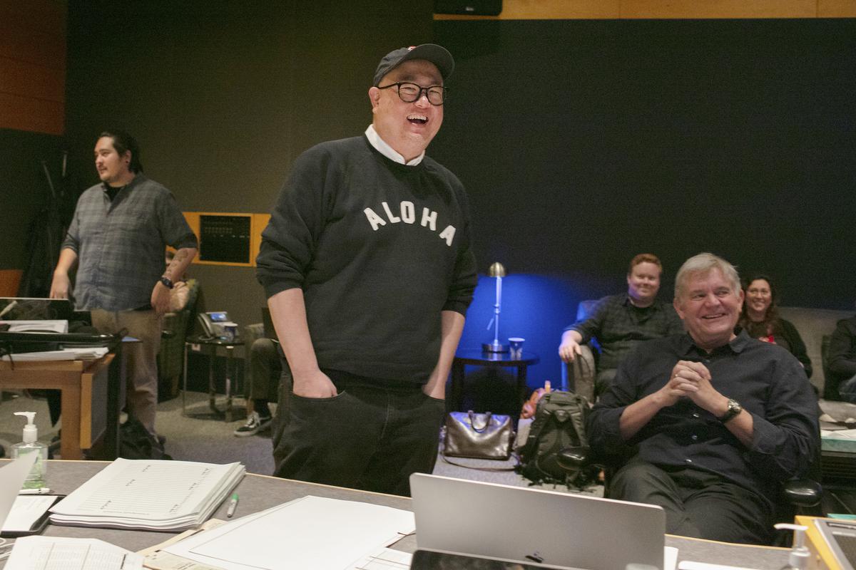 This image released by Disney-Pixar shows director Peter Sohn, center, at a scoring session for the film “Elemental” at Fox Studios on March 1, 2023 in Los Angeles