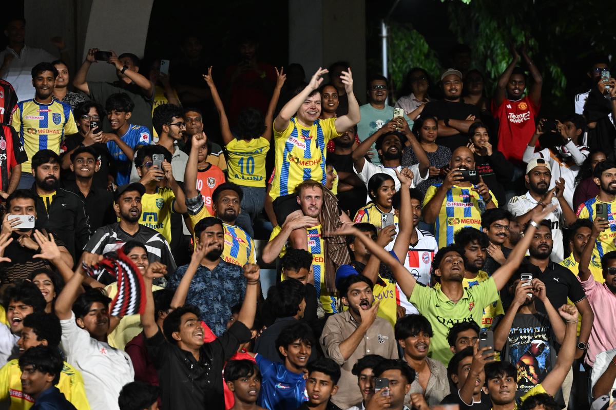 Kerala Blasters FC fans celebrate the victory against Bengaluru FC in the Indian Super League match held in Kanteerava stadium in Bengaluru on April 11, 2026.