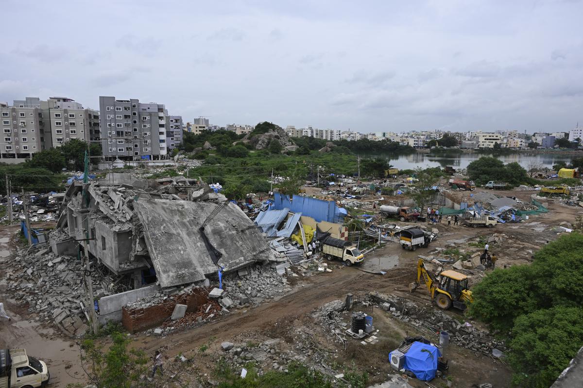Hyderabad Disaster Response and Assets Monitoring and Protection Agency (HYDRA) carry out a demolition campaign against illegal construction, at Sunnam cheruvu of Madhapur in Hyderabad on Sunday, September 8, 2024. 