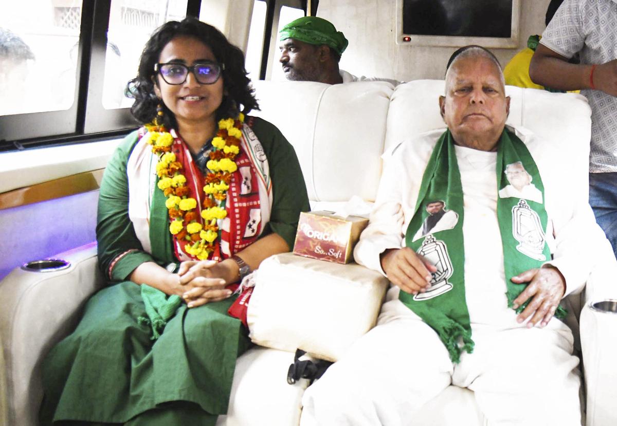 RJD chief Lalu Prasad with CPI(ML) candidate from Digha Assembly constituency, Divya Gautam during a road show ahead of Bihar Legislative Assembly election, in Patna, Monday, Nov. 3, 2025. RJD chief Lalu Prasad with CPI(ML) candidate from Digha Assembly constituency, Divya Gautam during a road show ahead of Bihar Legislative Assembly election, in Patna, Monday, Nov. 3, 2025.