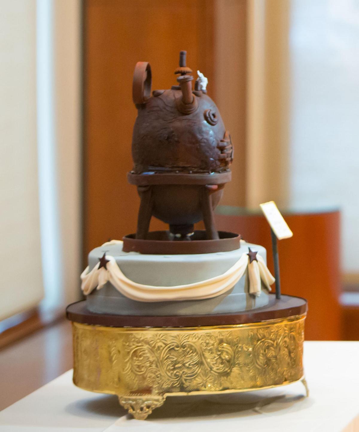 “Cakelyzer” was a cake at the fifth anniversary of the Chemical Heritage Foundation‘s museum opening in Philadelphia. The cake is modelled after an actual object in the museum’s collection, a replica Bakelite oven or “Bakelizer”, invented by Leo Baekeland. “Cakelyzer” was a cake at the fifth anniversary of the Chemical Heritage Foundation‘s museum opening in Philadelphia. The cake is modelled after an actual object in the museum’s collection, a replica Bakelite oven or “Bakelizer”, invented by Leo Baekeland.
