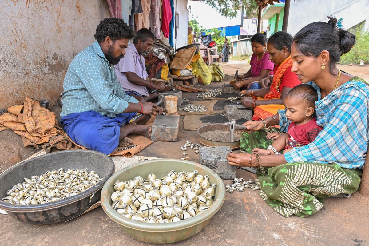 A family of bell makers at work in Venkatanayakanpatti.