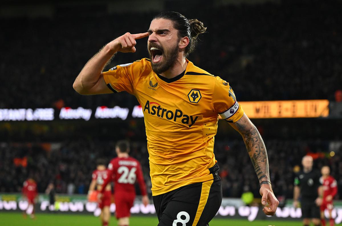 Ruben Neves of Wolverhampton Wanderers celebrates after scoring the team’s third goal during the Premier League match between Wolverhampton Wanderers and Liverpool FC at Molineux on February 04, 2023, in Wolverhampton, England. In a Premier League first, both sets of players, and match officials, will wear Green Football Weekend sustainable green armbands to highlight the initiative and put the conversation about climate change and sustainability on the world stage. 