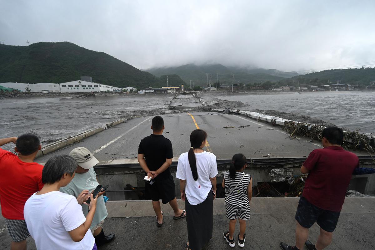 At least 20 dead and 27 missing in floods surrounding China's capital  Beijing, thousands evacuated - The Hindu