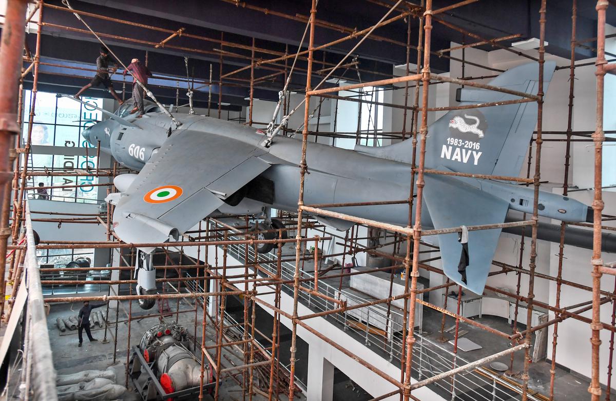 The decommissioned fighter jet plane Sea Harrier being installed inside the newly built Sea Harrier museum in Visakhapatnam 