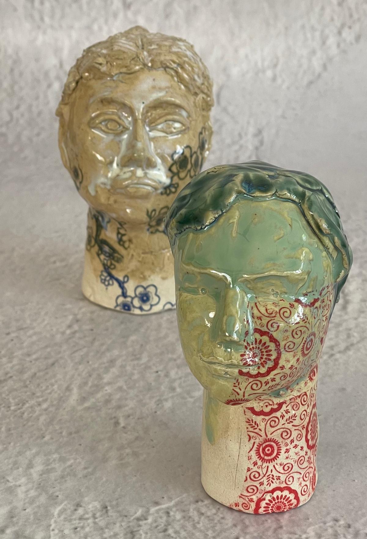 A pair of ceramic heads