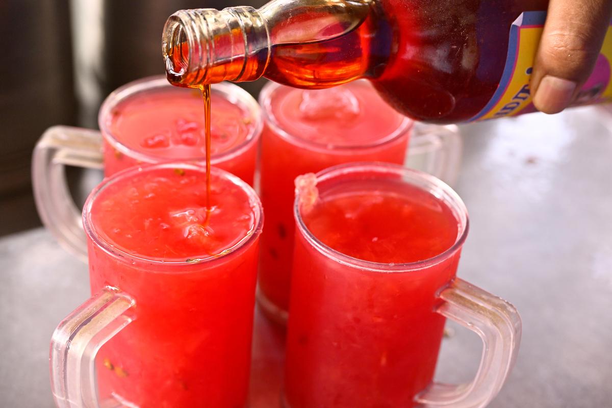 David offers refreshing watermelon sharbat at The Madura College, Madurai.