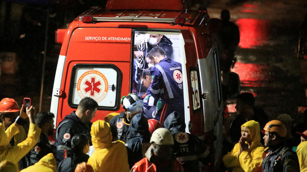 Condemned building used by homeless people falls in Brazil, killing 14 people