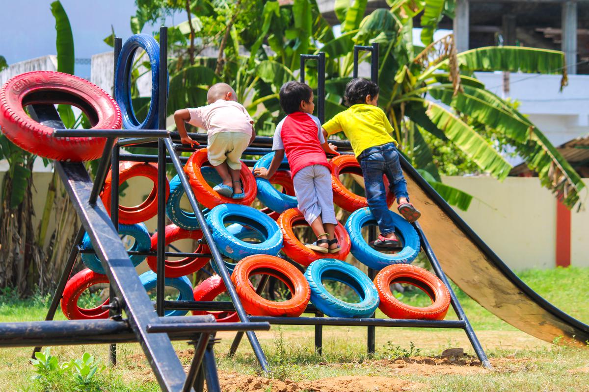 Children playing at a playground created with discarded tyres under Project Play, the brainchild of young IAS officer Dhatri Reddy, who is the Assistant Collector (UT) of Anakapalli district.