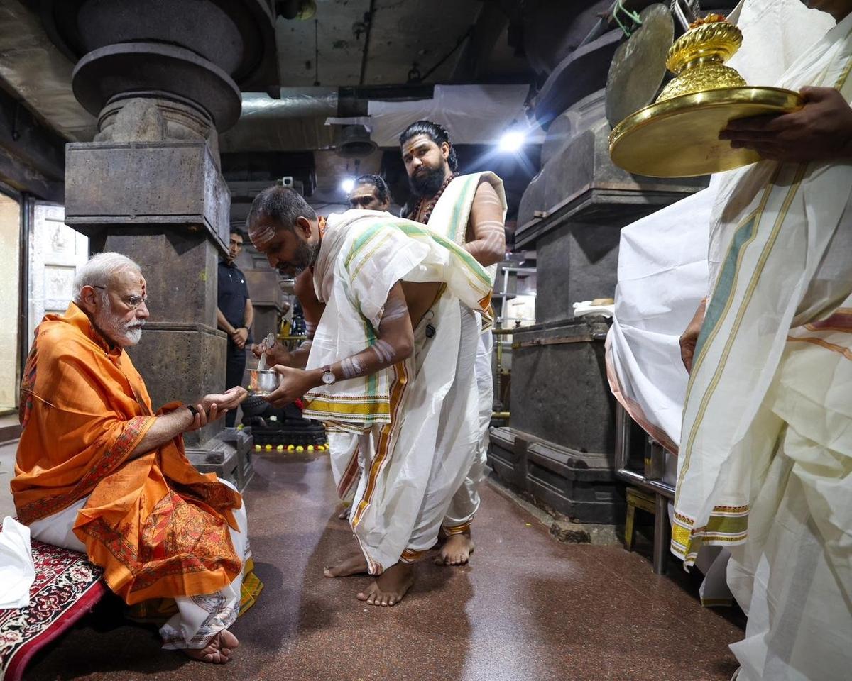 Prime Minister Narendra Modi being welcomed as per temple traditions on his arrival at the Jyothirlinga shrine of Sri Bhramaramba Mallikarjuna Swamy temple at Srisailam on Thursday. 