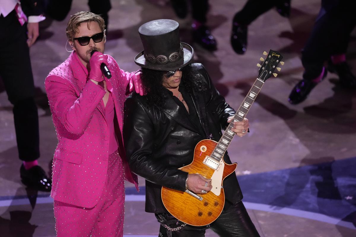Ryan Gosling performs with Slash Ryan Gosling performs with Slash