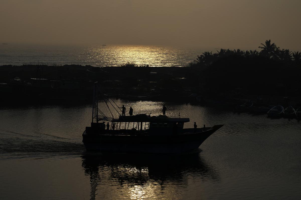 Fishermen get ready to launch their boat for fishing in Nagapattinam, one of the severely damaged town during 2004 tsunami, India, Sunday, December 15, 2024.