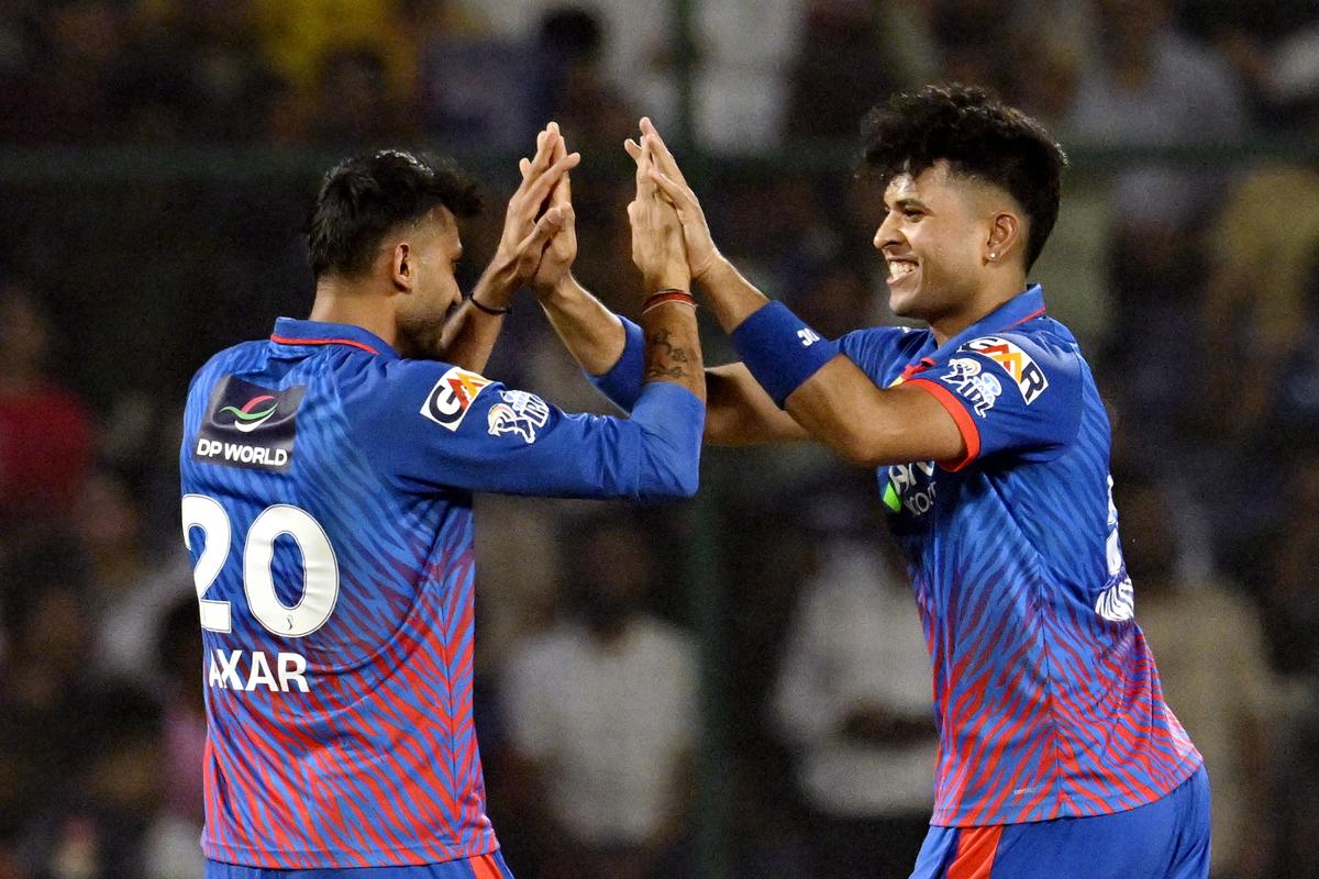 Delhi Capitals' Madhav Tiwari, right, celebrates with his captain Axar Patel after dismissing Rajasthan Royals’ Vaibhav Sooryavanshi during the Indian Premier League (IPL) 2026 T20 cricket match at the Arun Jaitley Stadium in New Delhi on Sunday, May 17, 2026.