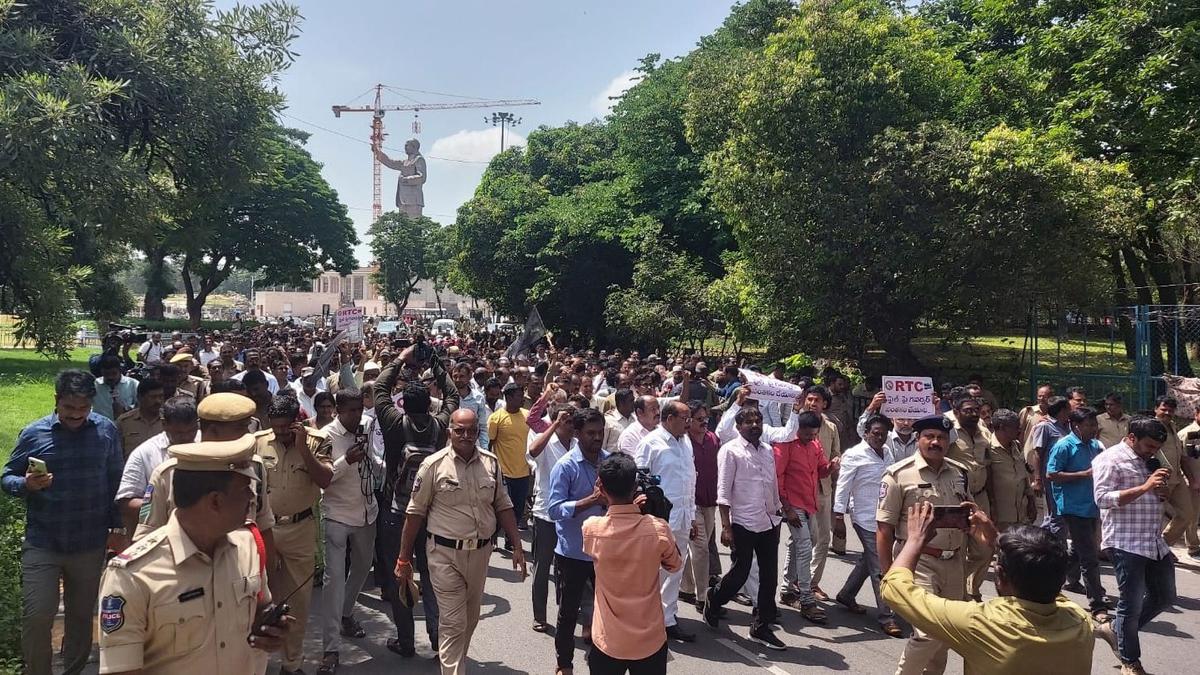 Hundreds of TSRTC workers take to the streets in Hyderabad demanding Governor clear merger bill
