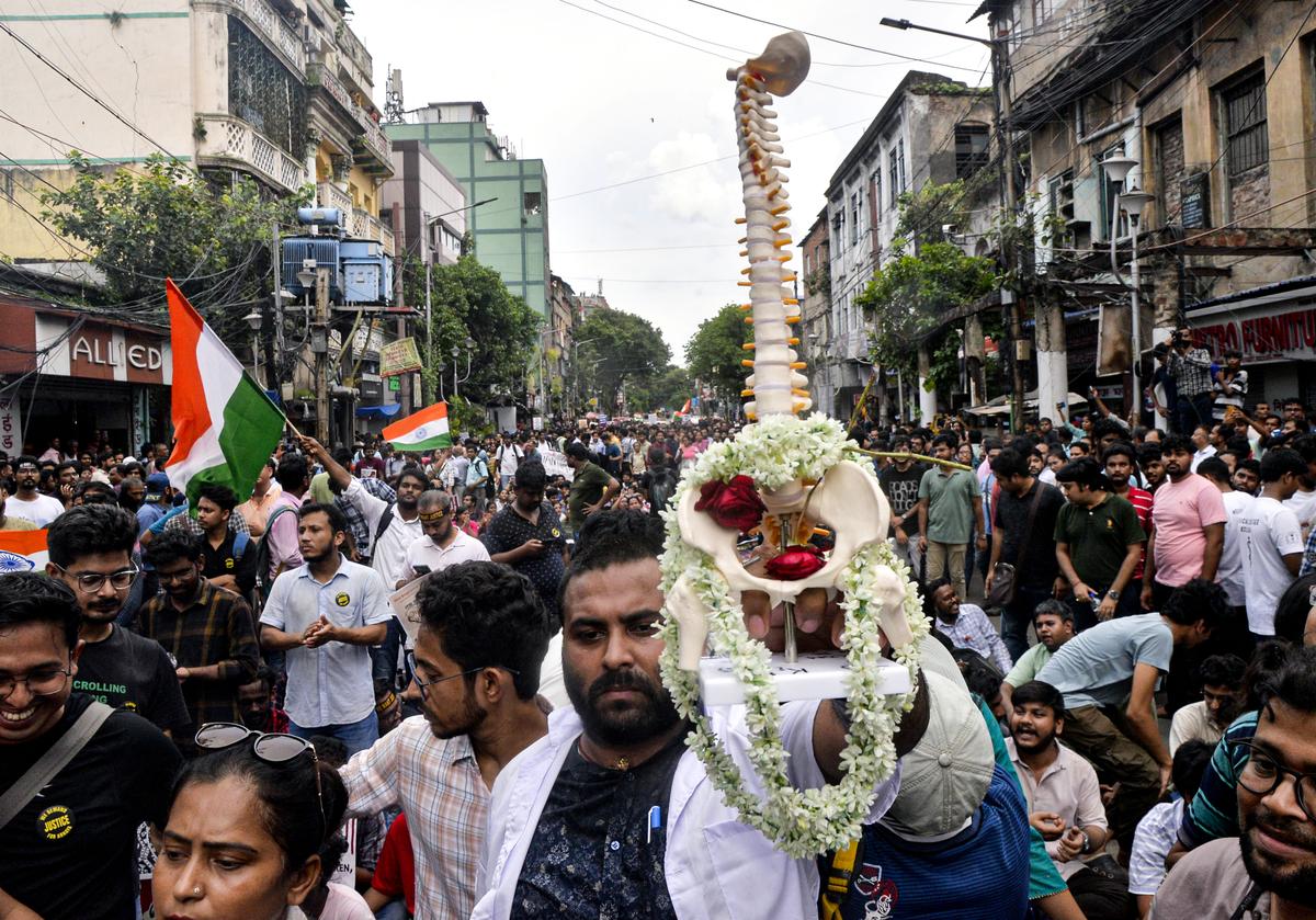 Junior doctors stage a protest against the alleged sexual assault and murder of a postgraduate trainee doctor at Kolkata RG Kar Hospital, in Kolkata on Monday, September 2. 