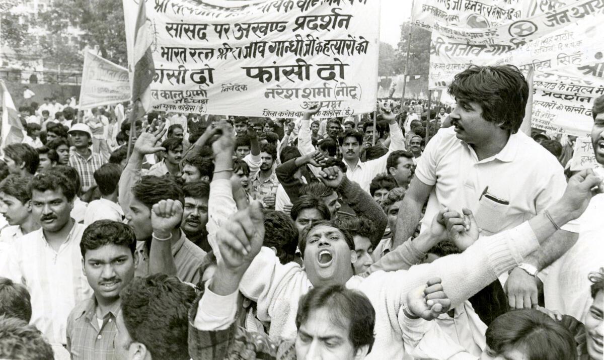 Delhi Youth Pradesh Congress (DYPC) activists demonstrating against DMK and Jain Commission Report at Parliament Street in New Delhi on November 18, 1997