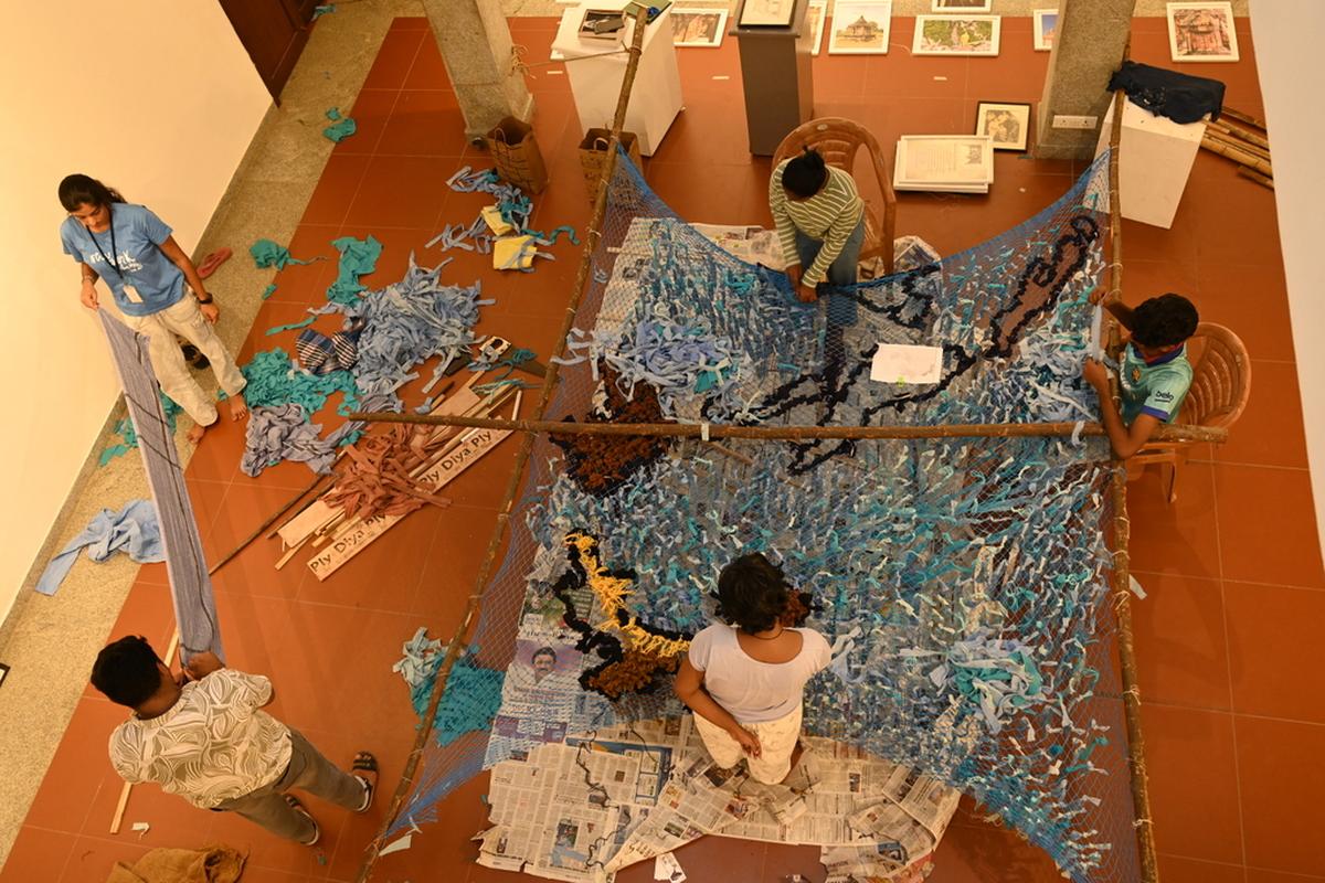 Artists setting up the exhibit