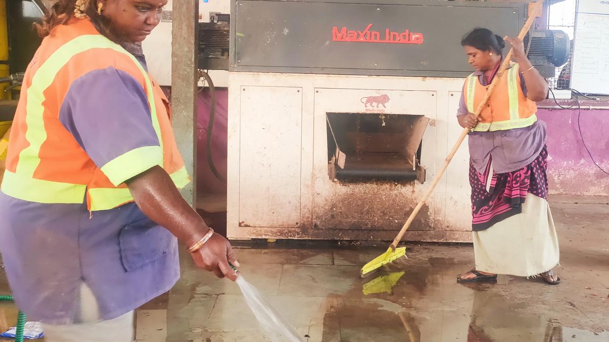 Conservancy workers handle solid waste sans protective gear