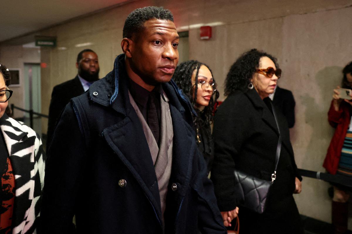 Actor Jonathan Majors arrives with Meagan Good for the jury selection in his  assault and harassment case at Manhattan Criminal Court in New York City, U.S., December 18, 2023