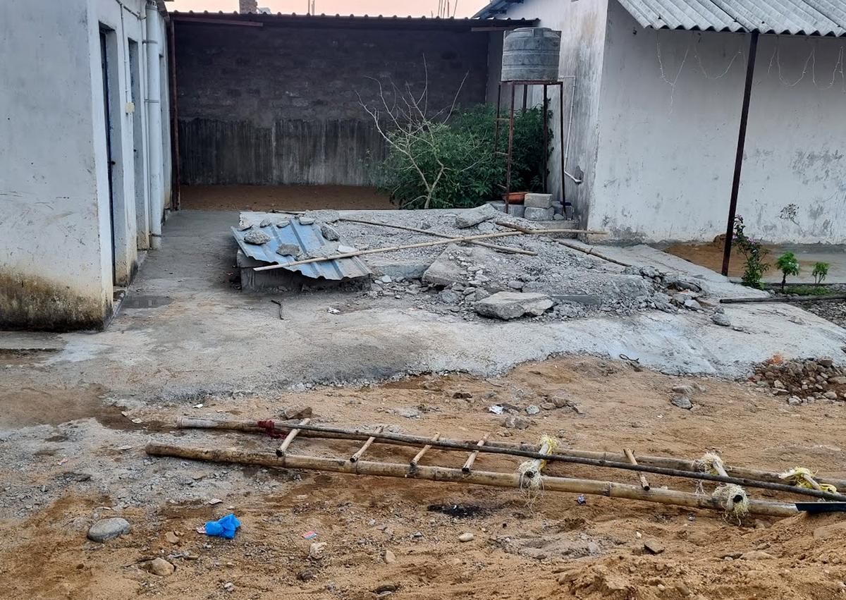 The septic tank in a shed owned by Suresh Chandrashekhar, in which Mukesh’s body was found. The septic tank was covered with a recently constructed concrete slab, which planted seeds of doubt in the minds of other journalists. 