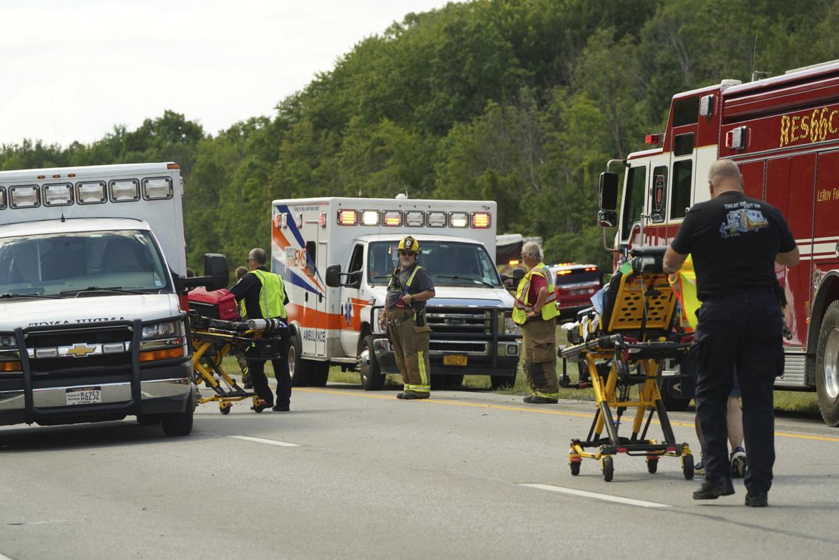 Rescue personnel work the scene of a tour bus that crashed and rolled over on the New York State Thruway near Pembroke, N.Y., on August 22, 2025. Rescue personnel work the scene of a tour bus that crashed and rolled over on the New York State Thruway near Pembroke, N.Y., on August 22, 2025.
