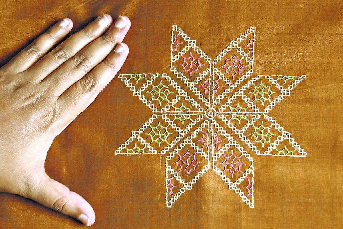 Kasuti work, a traditional art form of North Karnataka, seen on a sari