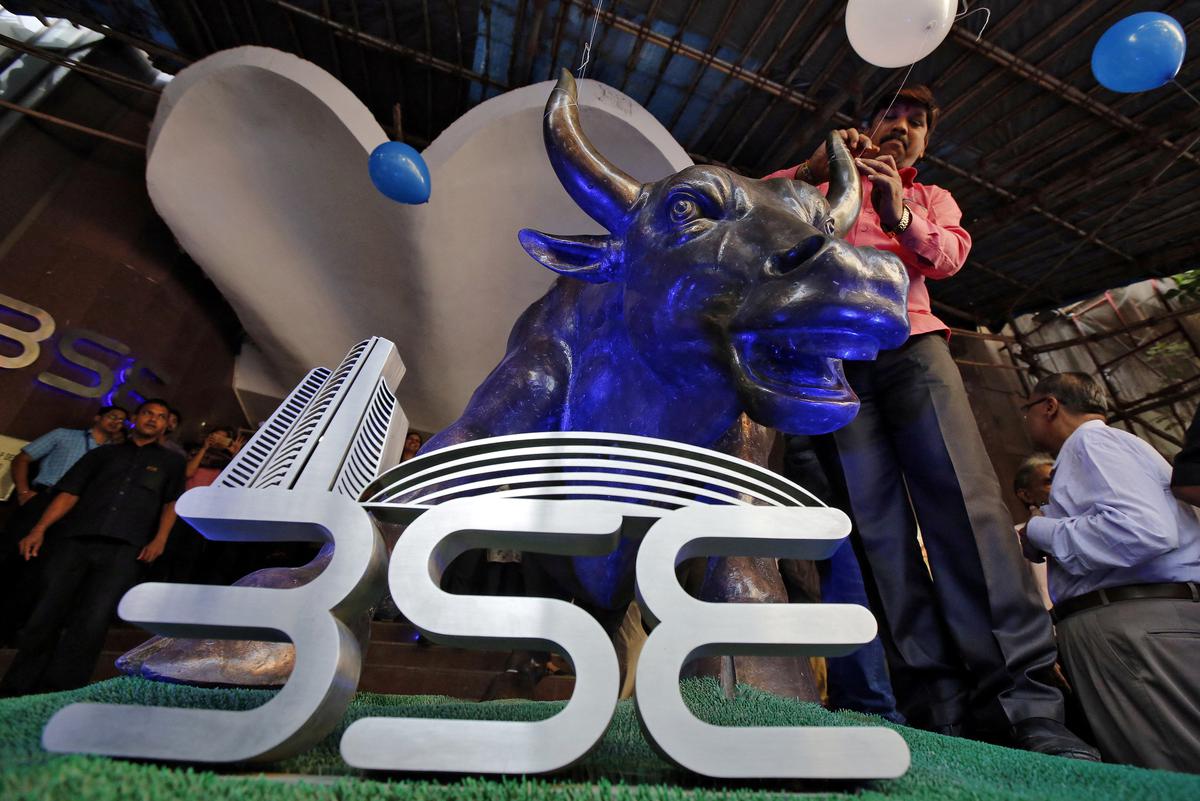 Sensex, Nifty close lower on selloff in power, metal stocks