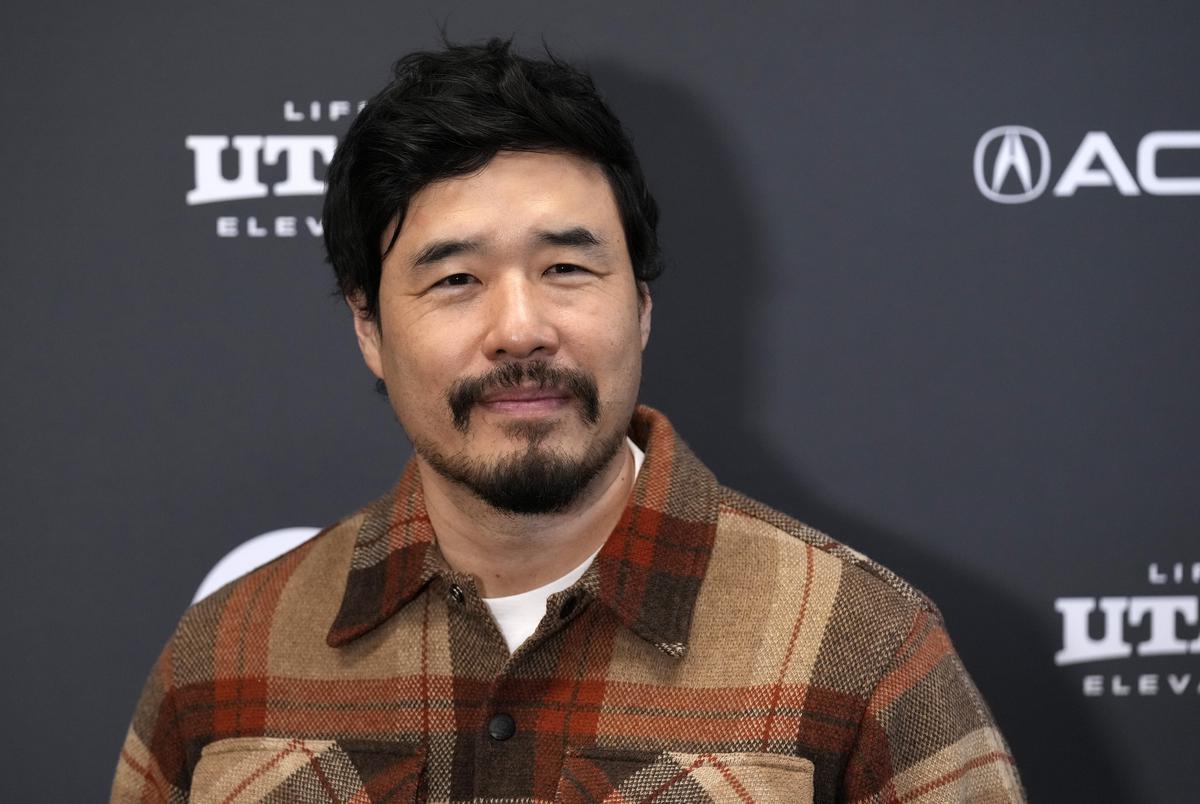 Randall Park, director of ‘Shortcomings,’ poses at the premiere of the film at the 2023 Sundance Film Festival