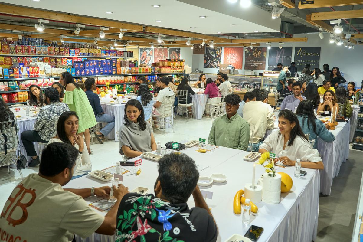                                Diners settles for a dinner at You can sit with us’s pop up at Q Mart