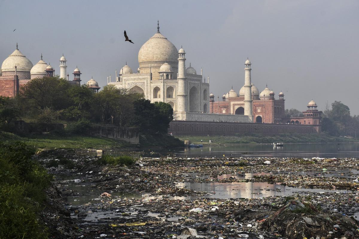 Polluted water of a drain that merges into the Yamuna river near Taj Mahal, in Agra. Polluted water of a drain that merges into the Yamuna river near Taj Mahal, in Agra.