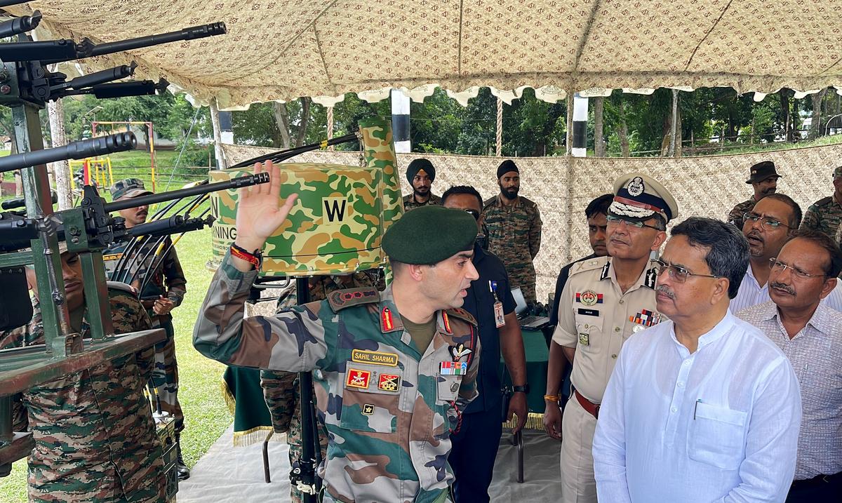 Tripura Chief Minister Manik Saha and DGP Anurag Dhankar being briefed by an Army official. Tripura Chief Minister Manik Saha and DGP Anurag Dhankar being briefed by an Army official.